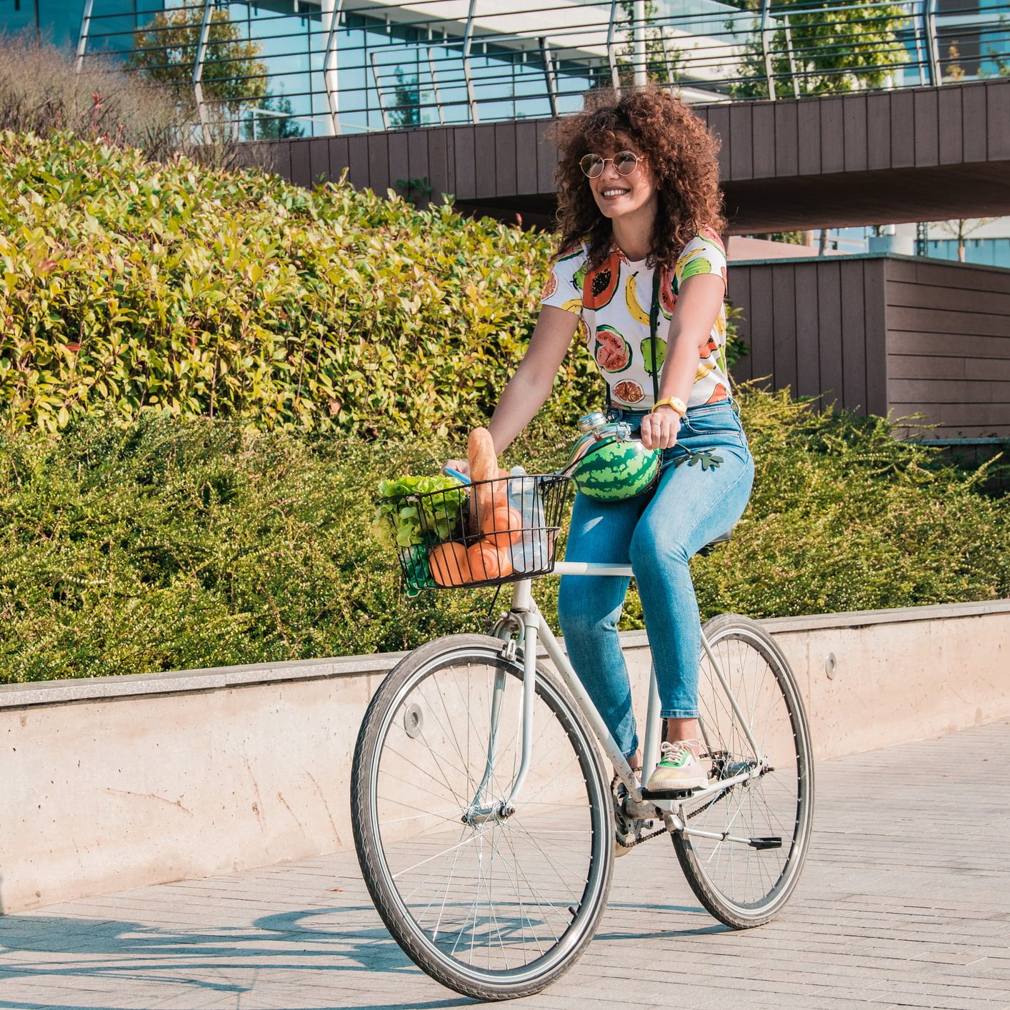 A young woman enjoys a bike ride during spring